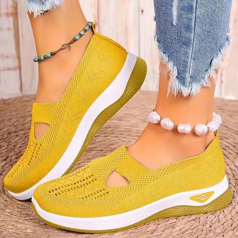 Casual mesh T-strap flat shoe for women in a selection of colours on a soft PVC sole.
