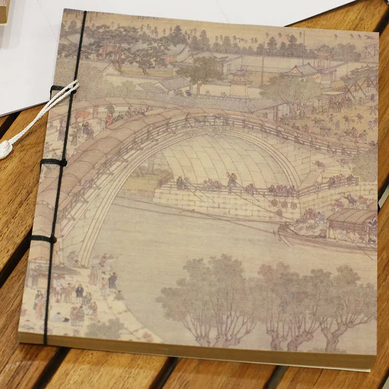A5 antique thread-bound notebook with embossed cover and decorative tassels