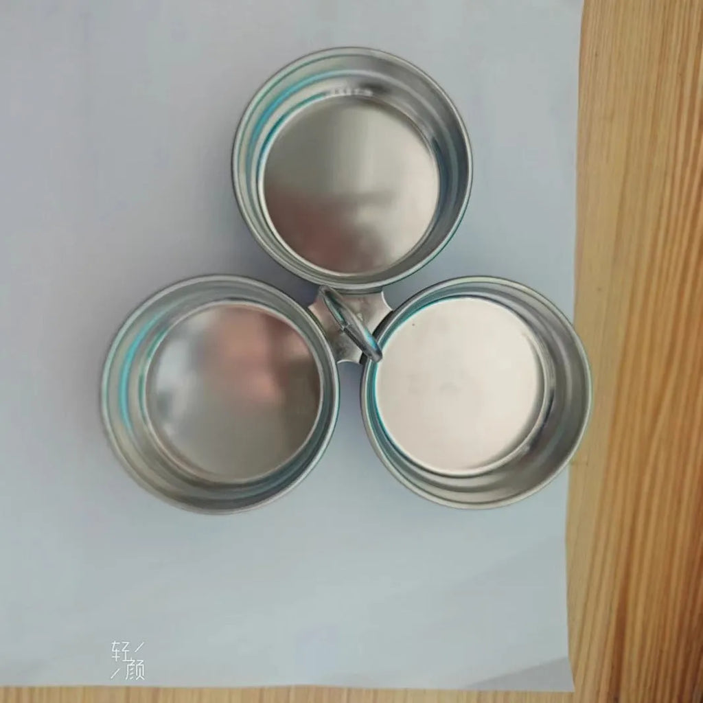 Small stainless steel heart-shaped egg steamer or round egg cooker for stovetop use