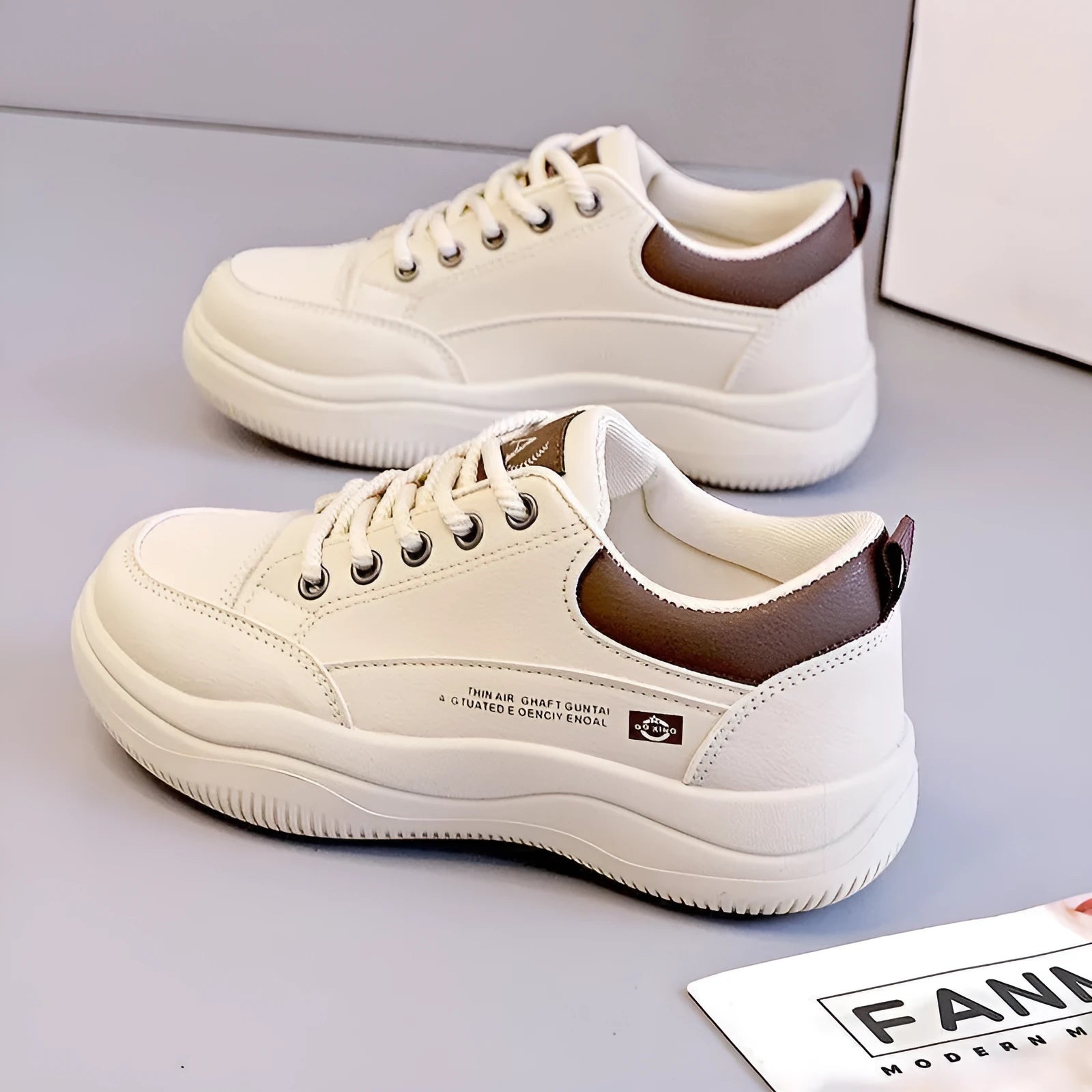 Women's Korean-style white pumps with cross straps and round toe, showing lace-up front and mid-heel