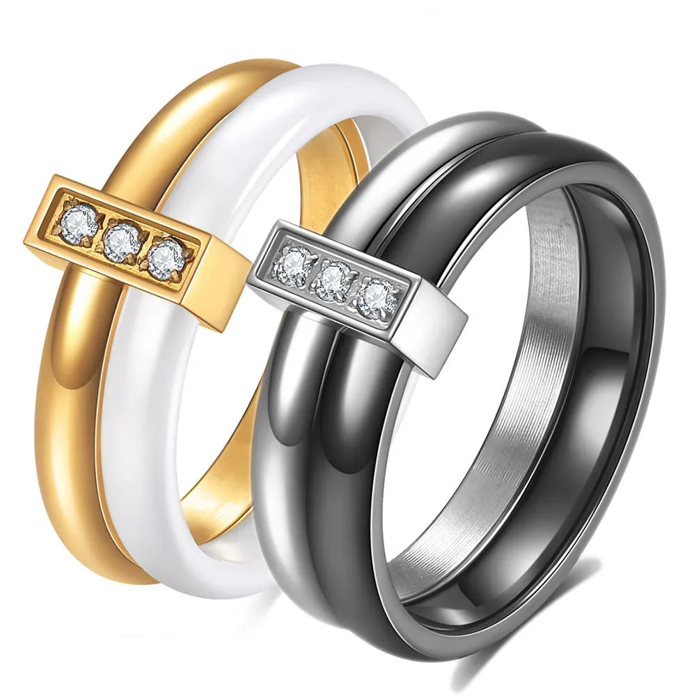 Women's ceramic ring with 6mm wide band and glossy zirconium inlay in steel black finish.