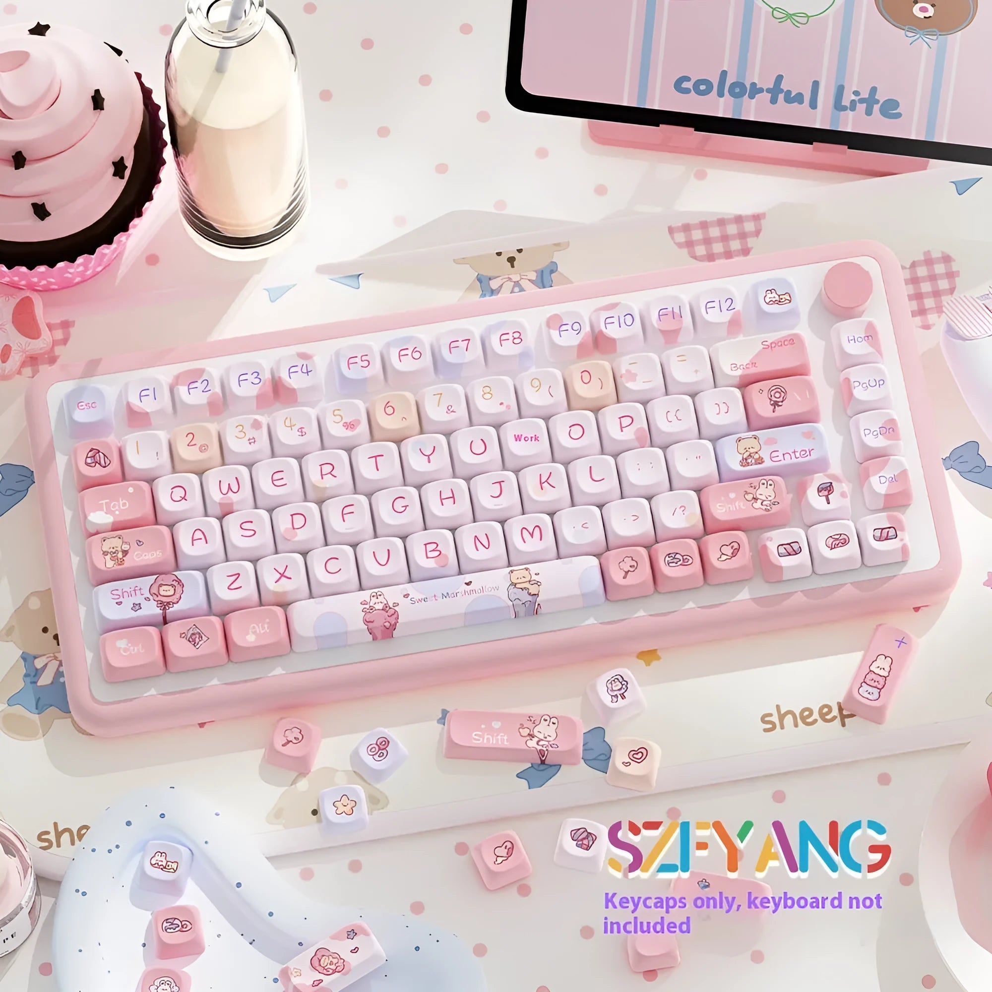 Sweet cotton candy gradient mechanical keyboard keycaps showing pink to blue colour transition