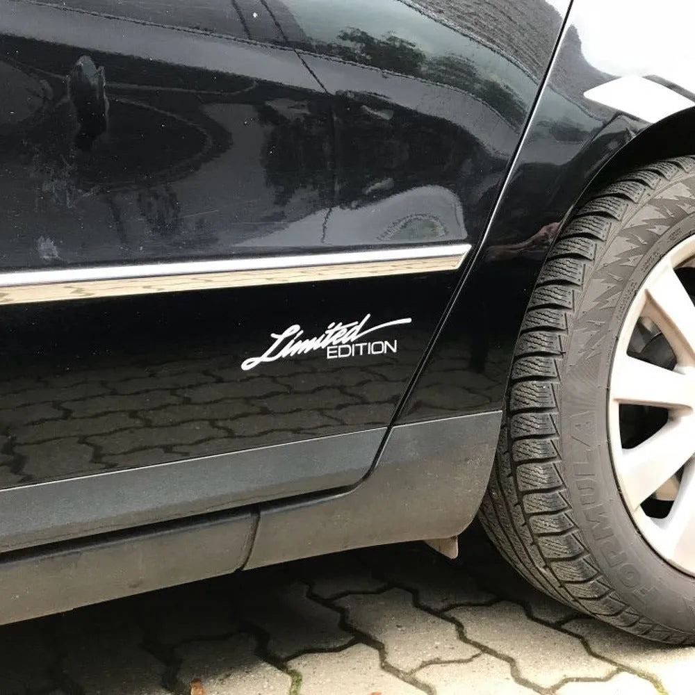 Reflective British bumper sticker showing 16cm by 3.8cm size in black, white, and colourful options