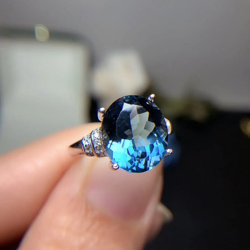 London Blue Topaz ring in deep dark blue crown cut on 925 silver with white gold plating adjustable opening