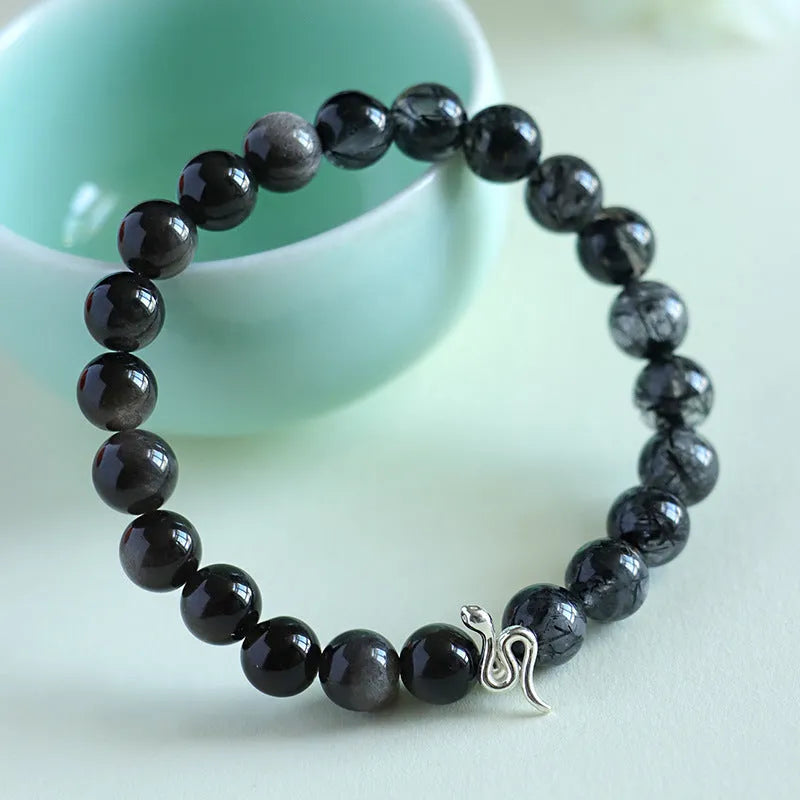 925 silver snake beaded bracelet with black hair crystal stone accents on white background