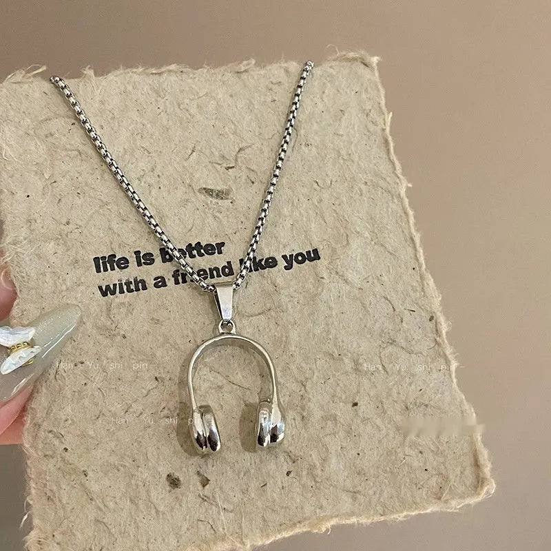 Alloy headset necklace electroplated finish unisex casual pendant jewellery on white background