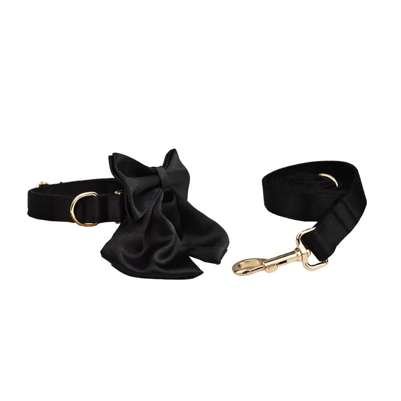 Cloth dog collar and leash set with matching decorative bow and dog vest in various sizes
