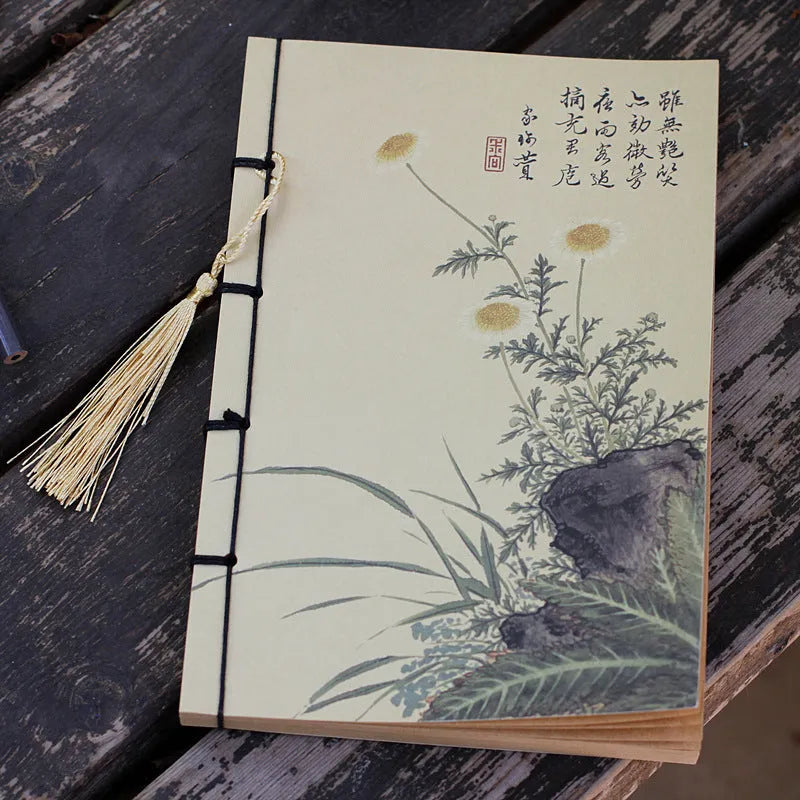 A5 antique thread-bound notebook with embossed cover and decorative tassels
