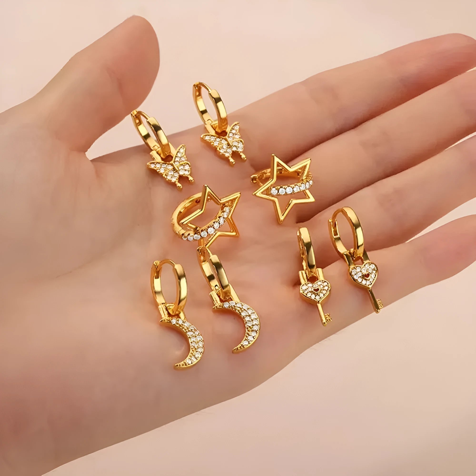 Women's copper geometric butterfly earrings with heart, star, and bow details in multiple colour options.