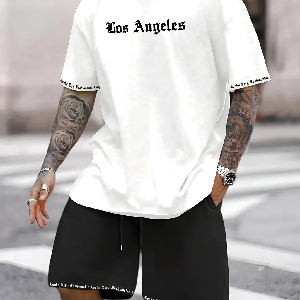 Sports style short-sleeved shirt and matching shorts set in a thin, printed fabric on a mannequin.