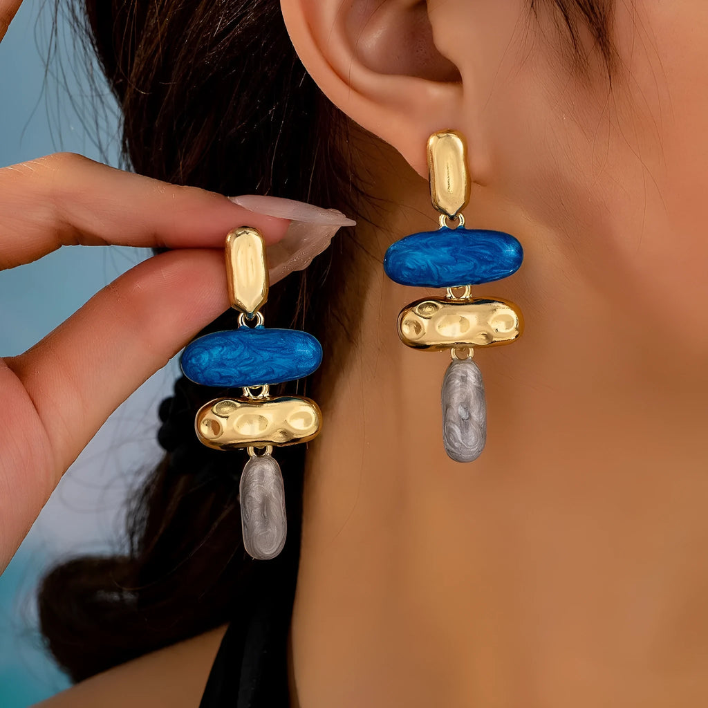 Geometry shaped stud earrings with multicolour electroplated finish on zinc alloy