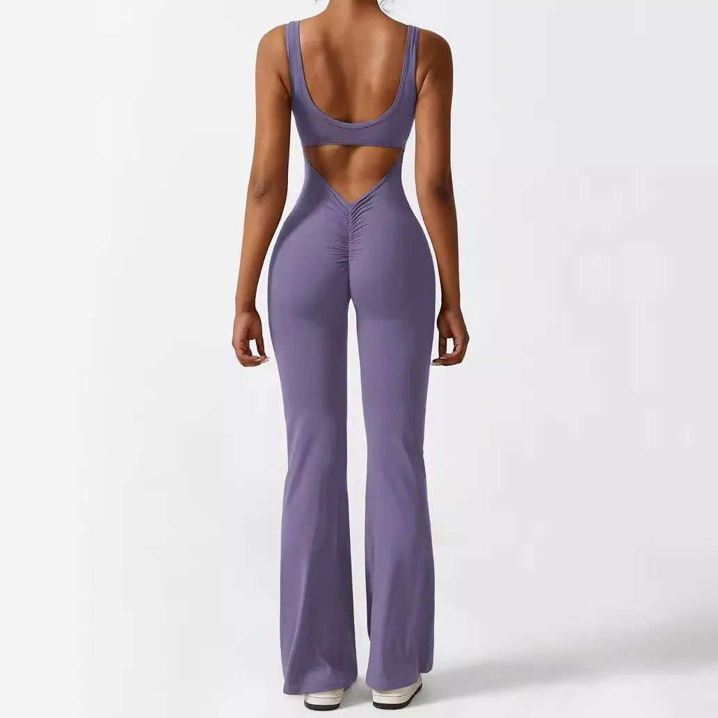 Women's sleeveless flare leg jumpsuit for yoga in high-elasticity polyester fabric.