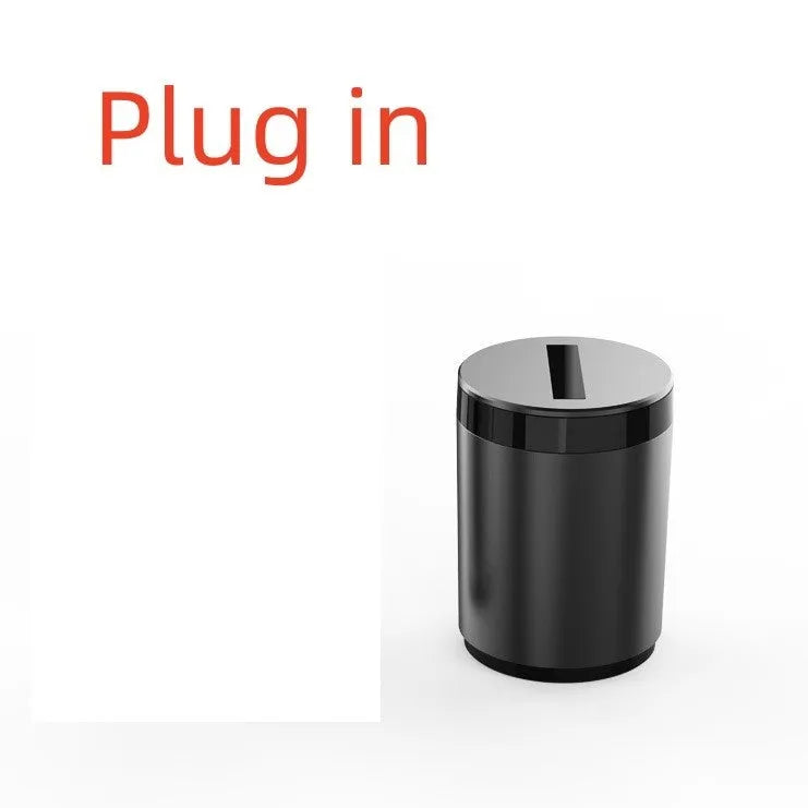 Silver intelligent induction ashtray with automatic lid on a car centre console