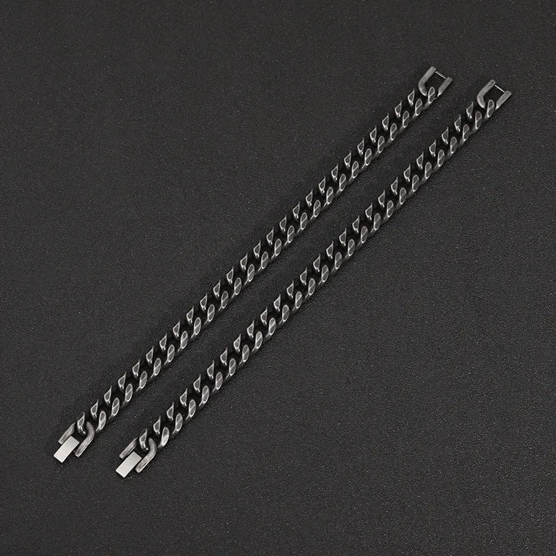 Silver titanium steel geometric bracelet with 10mm width on a neutral background