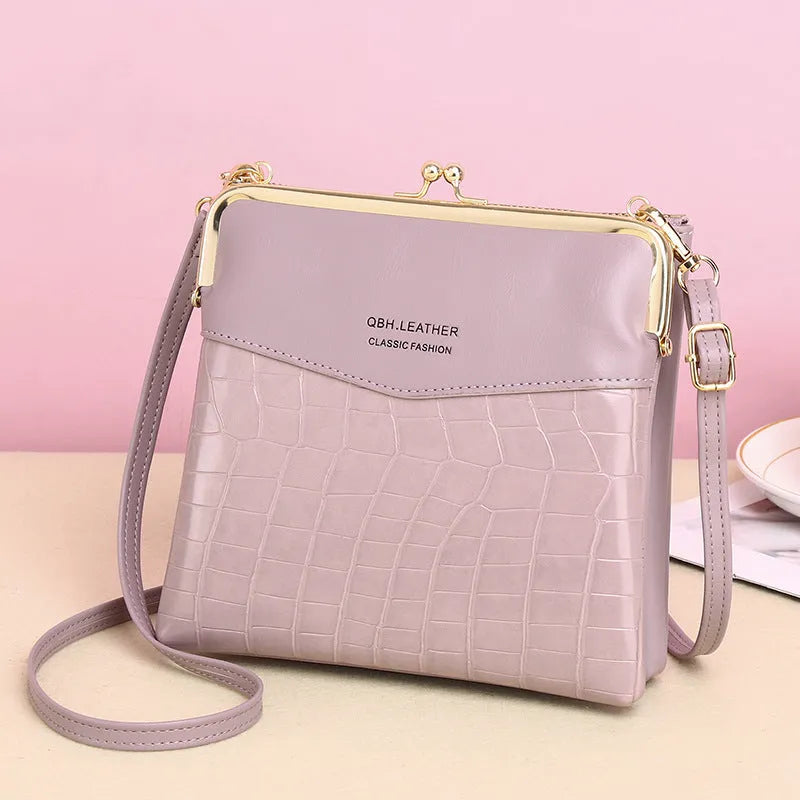 Mid-length PU leather messenger bag for women in retro embossed finish with multiple compartments, 18x4x17cm, wine red colour