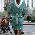 Men's peacock blue 3D printed knitted shorts suit with matching T-shirt, showing fifth-pant length trousers