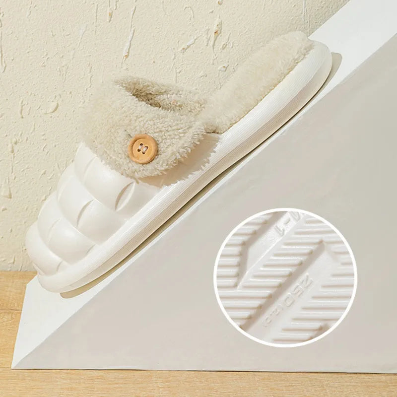 Plaid patterned EVA detachable slippers with plush lining, shown in pink, on a plain background.