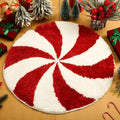 Round Christmas carpet with festive blanket design on floor beside holiday decorations