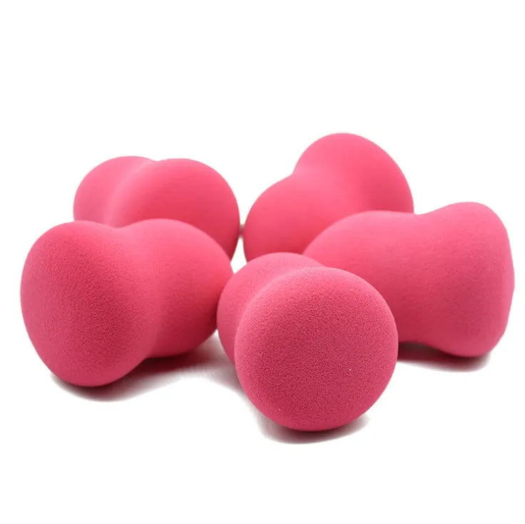 Pink makeup foundation sponge cosmetic puff with 4x4x5.6cm dimensions for wet or dry application