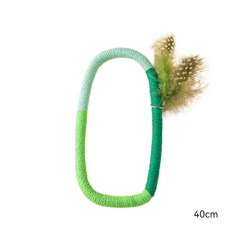Green circular cotton rope cat toy with feathers and catnip for interactive play and dental cleaning