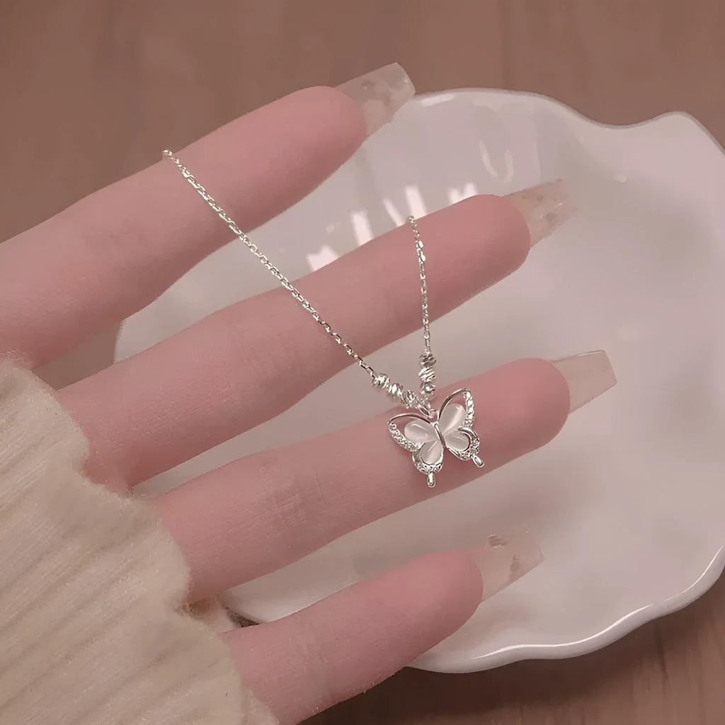 Women's silver butterfly necklace with square opal pendant on cross chain, adjustable length jewellery