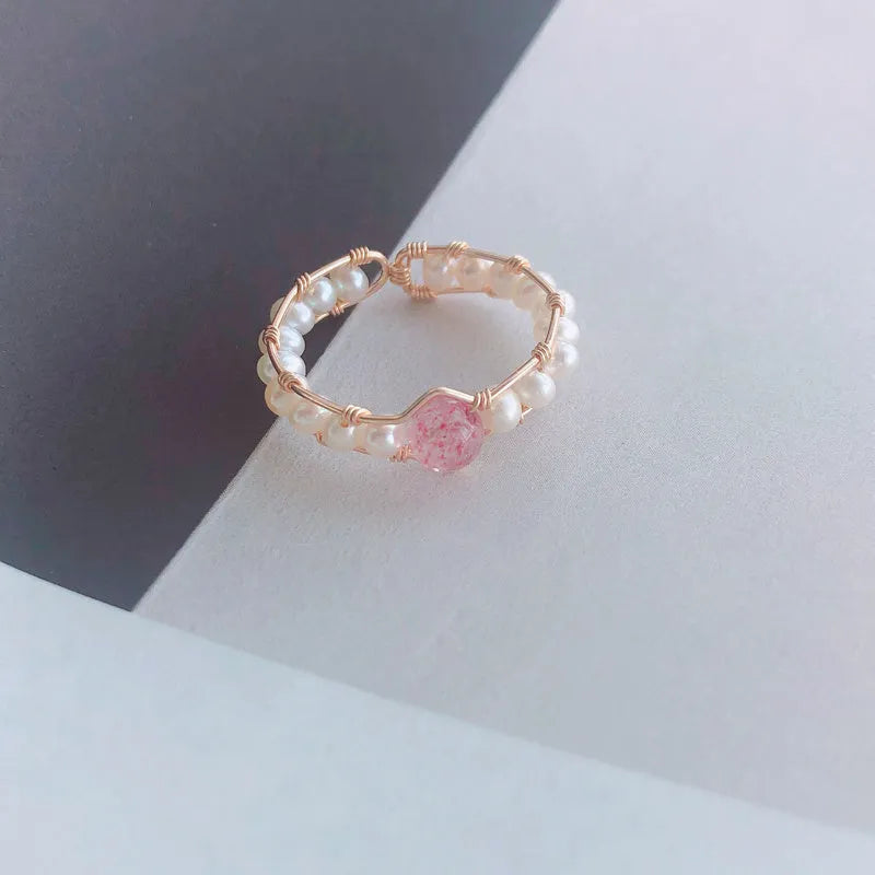 Grey Moonlight Pearl Ring with natural moonstone and blue labradorite crystal on finger, women's ring size model