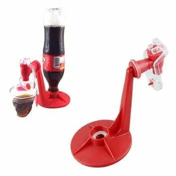 Red plastic Magic Tap soda dispenser screwed onto a 2-litre bottle with push-in tap