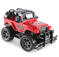 Wrangler Knight remote control off-road car in red on a grass surface with controller