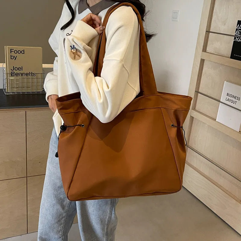 Soft Oxford cloth commuter shoulder tote bag in multiple colours with folding street trend design