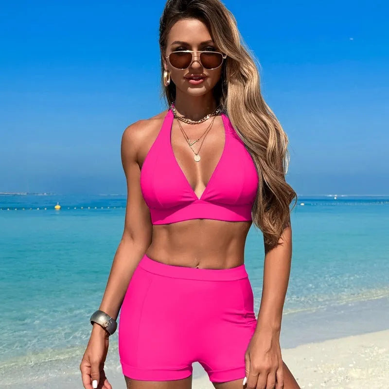 Women's black nylon bikini swimsuit with polyester lining, shown on model