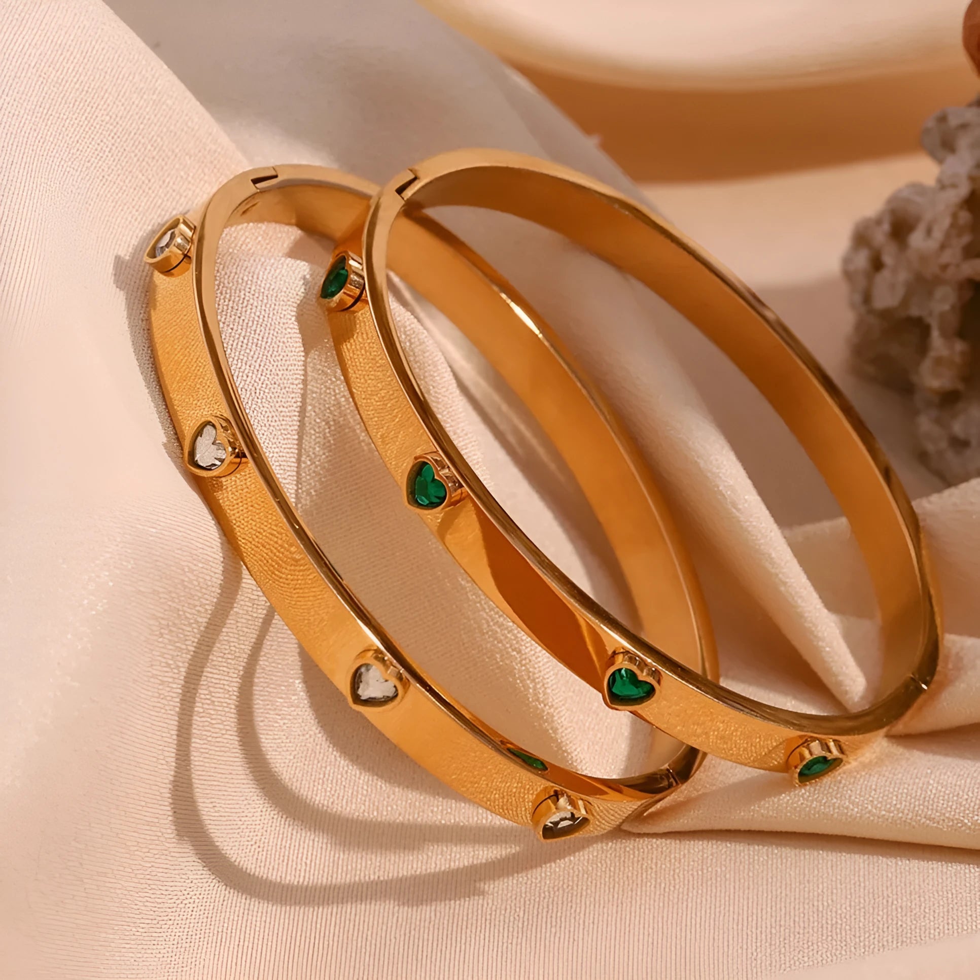 Stainless steel bracelet with a peach heart charm, shown in golden-lvzuan finish.