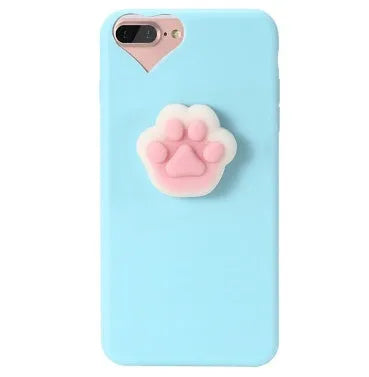 Soft pink silicone iPhone case with a raised 3D cartoon cat design on the back.