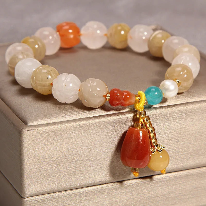 Women's yellow agate crystal bracelet with gold silk thread in khaki color