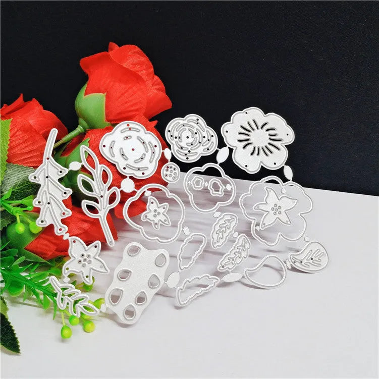 Silver carbon steel flower cutting die for papercraft measuring 14.3 by 9.9 centimetres