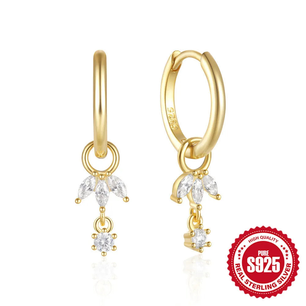 S925 sterling silver geometric sunflower stud earrings with golden zircon detail.