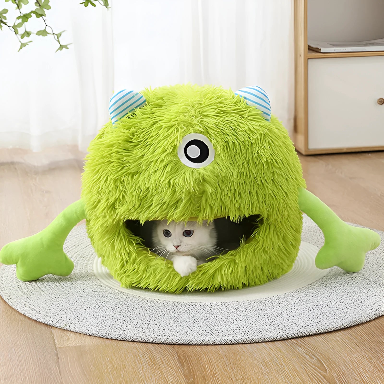Round fluffy cat bed with plush material and non-slip base in three size options
