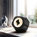 Floating magnetic fluid Bluetooth speaker in black showing fluid spikes, on a desk, with compact 137mm dimensions
