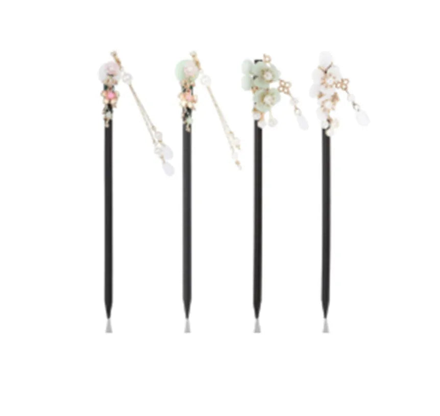 Chinese ancient style floral alloy hairpin with electroplated finish on dark background