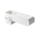 White plastic kitchen knife rack with modern simple design on countertop holding several knives
