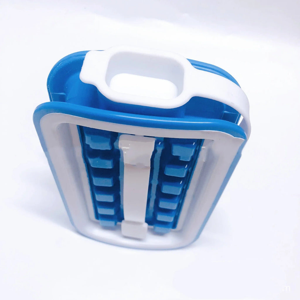Blue silicone ice cube tray with 36 grid mould and lid on a white surface