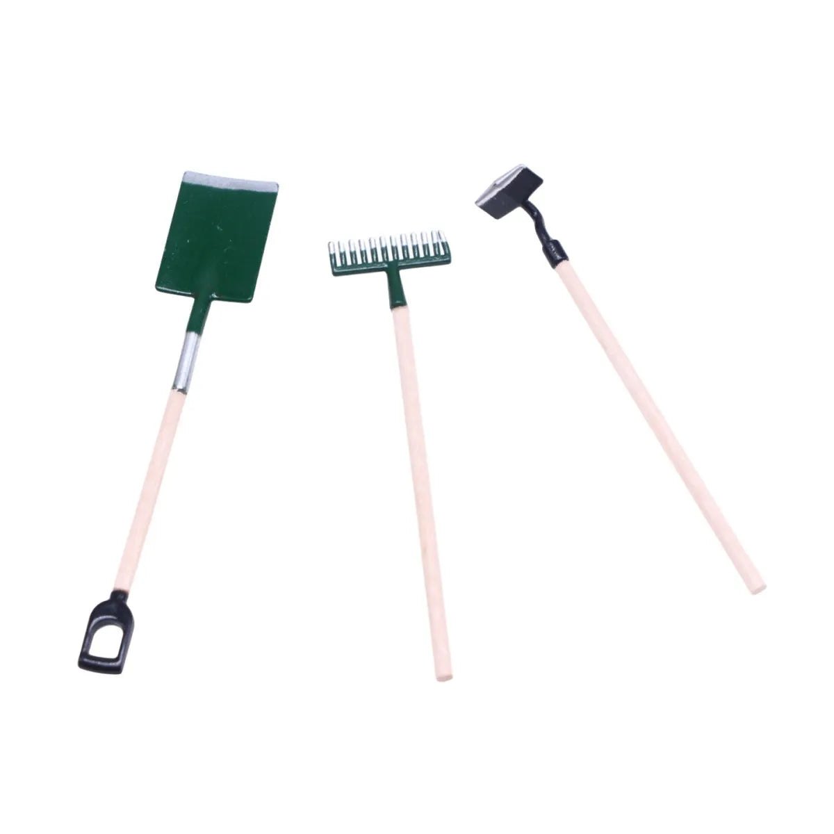 Three miniature alloy gardening tools set for dollhouse or elf garden scenes on white background