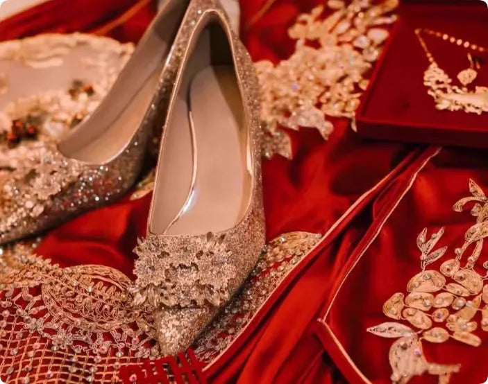 Champagne coloured pointed toe bridal shoes with rhinestone decoration on a fine heel.