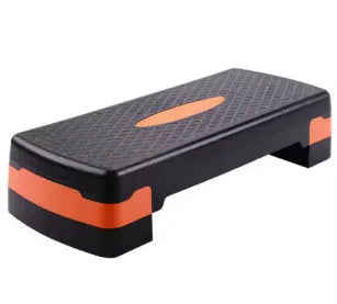 Fit Step aerobics platform in grey on a home floor, showing its 68cm length and 15cm height.