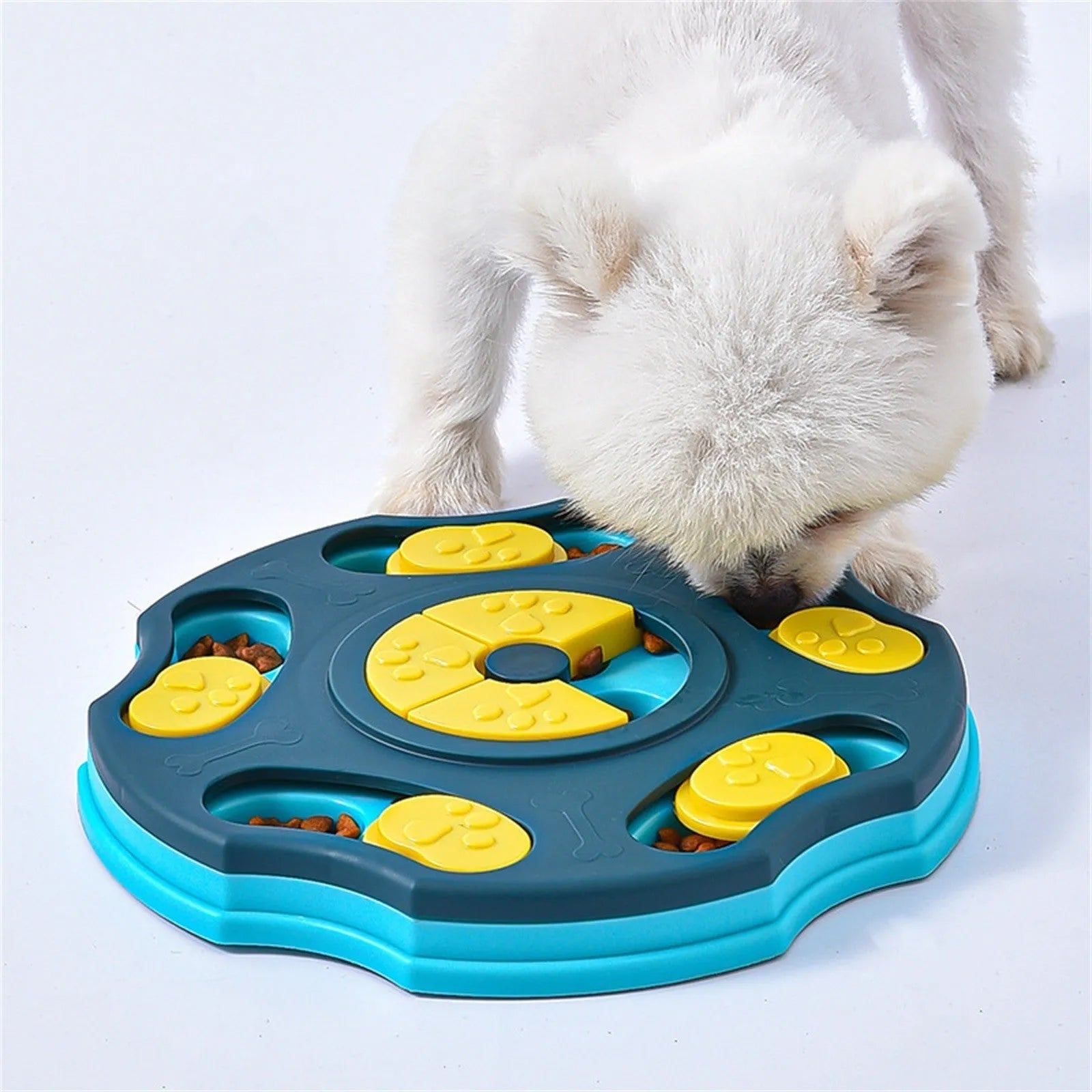 Blue and pink dog puzzle feeder toy for aggressive chewers, a food-searching interactive game.