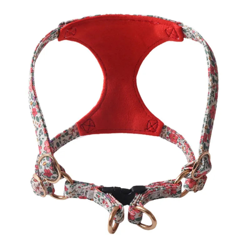 Cloth dog harness and leash set shown in various colours including a floral print, for small dogs.