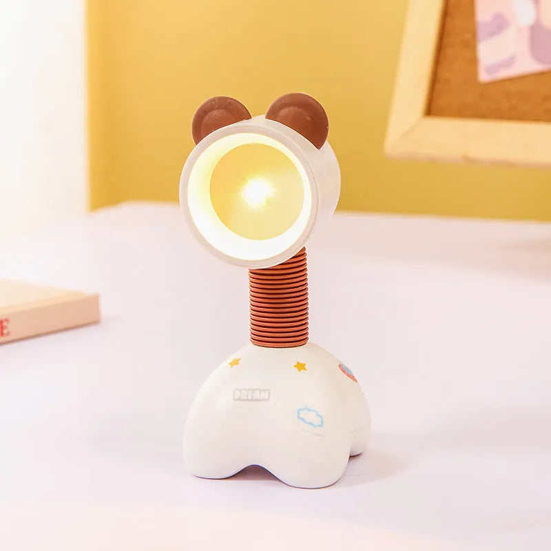 DIY cartoon magnetic small night lamp in assorted animal styles and colours on a desktop.