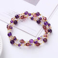 Handmade three-ring bracelet with colourful tourmaline, strawberry quartz, and amethyst beads on an adjustable cord.