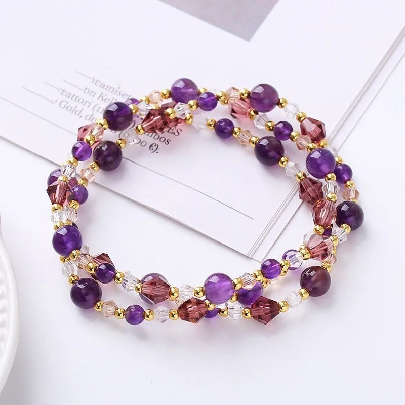 Handmade three-ring bracelet with colourful tourmaline, strawberry quartz, and amethyst beads on an adjustable cord.