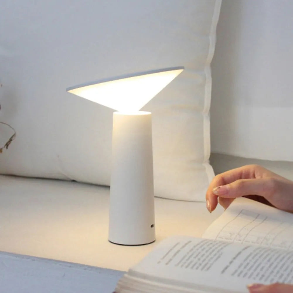Black or white USB rechargeable table lamp with touch sensor and adjustable LED head.