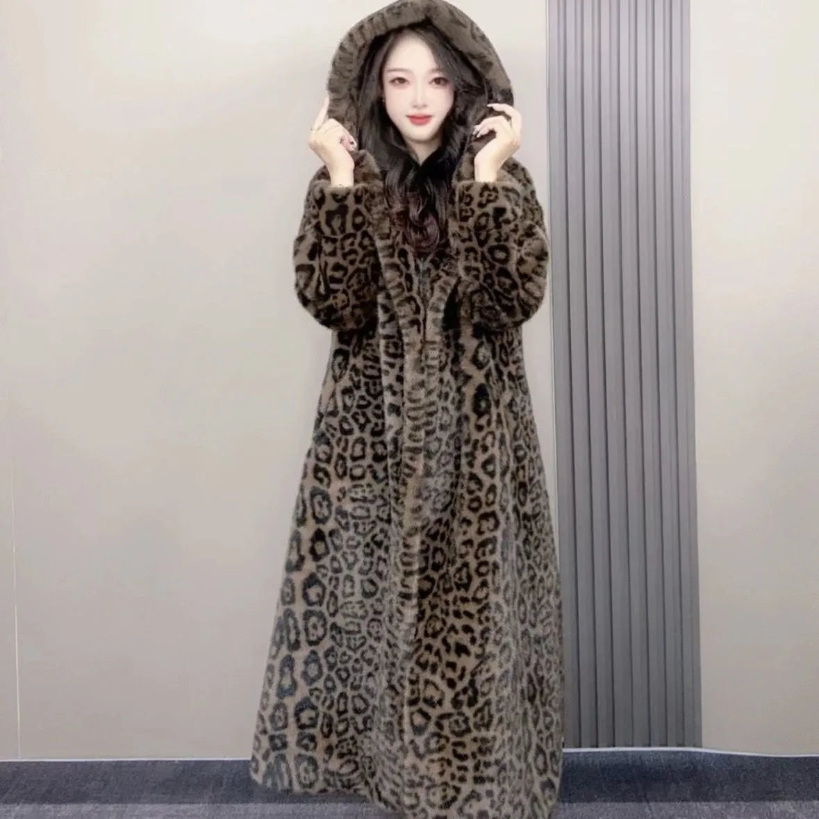 Plus size brown leopard print faux fur long coat on a hanger